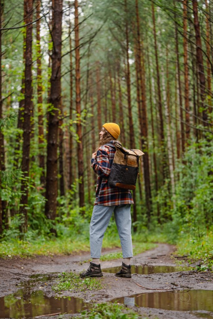 Woman walking in nature after Optum insurance coverage.